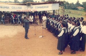 Former Dean of Students Mr. Christopher Kasasa as a Choral Director at a Graduation in 1993